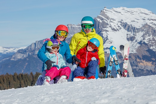 Family,In,Ski,Gear,,With,Bright,Smiles,Ready,For,A